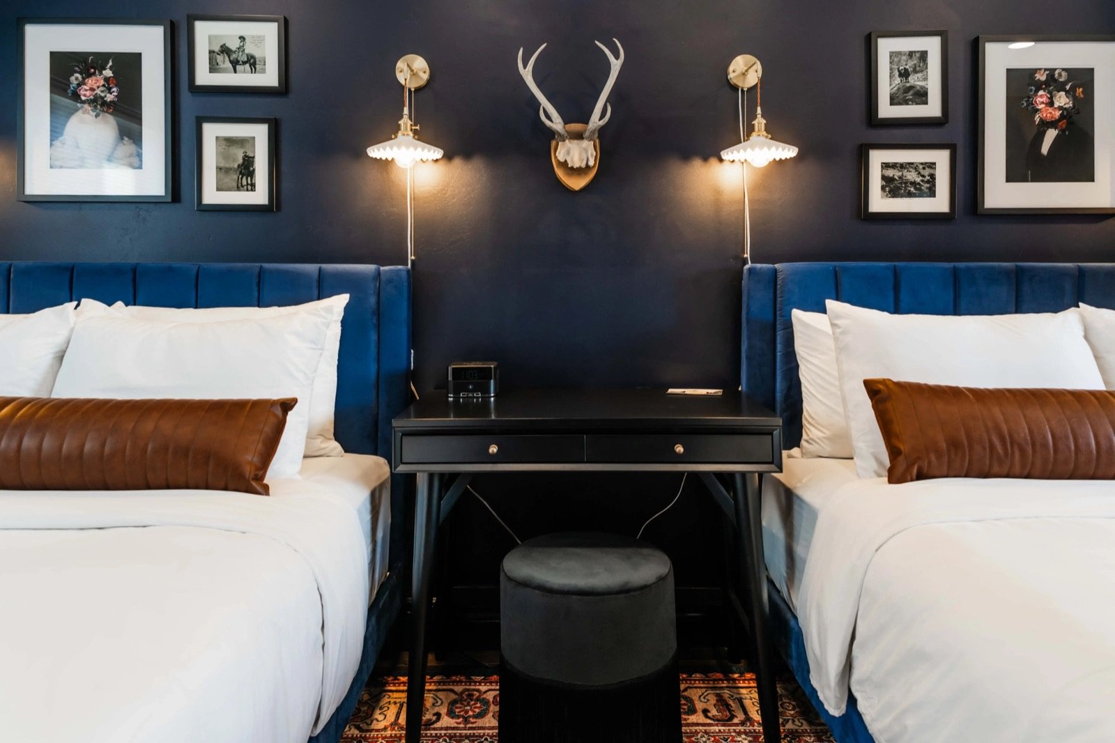 A guest room with two queen beds